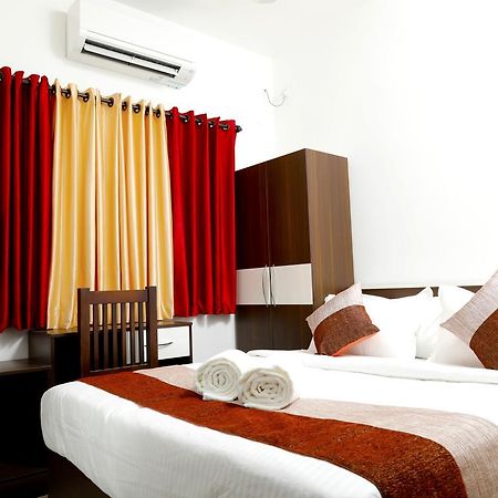 Puthens Clifton Inn Kottayam Eksteriør bilde
