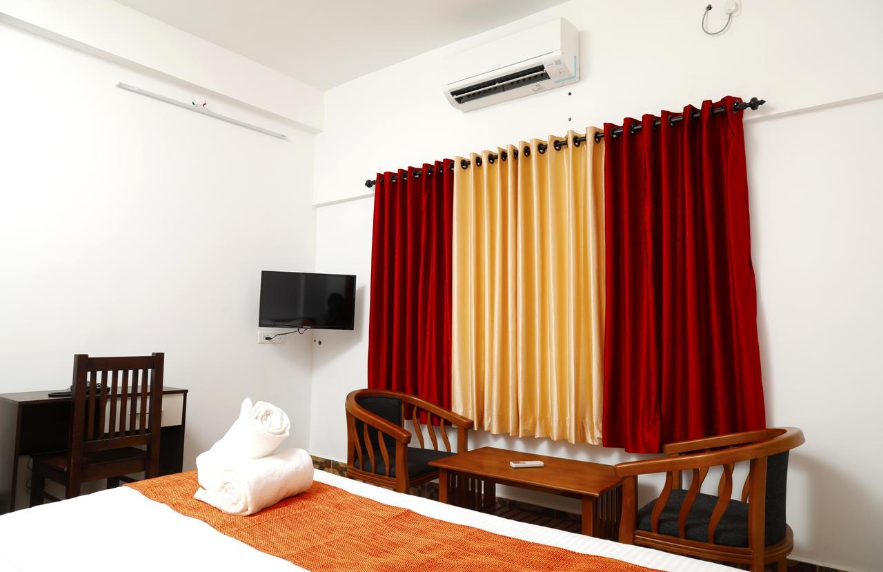 Puthens Clifton Inn Kottayam Eksteriør bilde