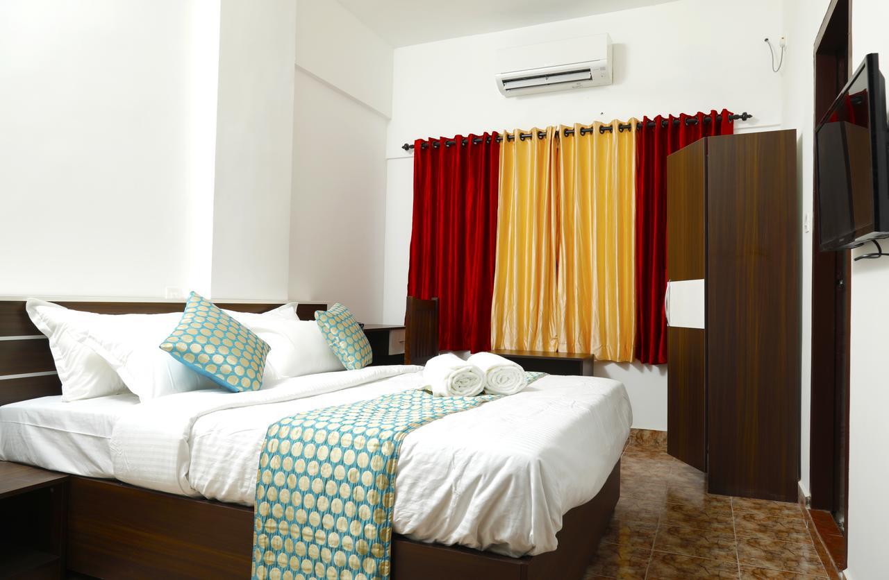 Puthens Clifton Inn Kottayam Eksteriør bilde