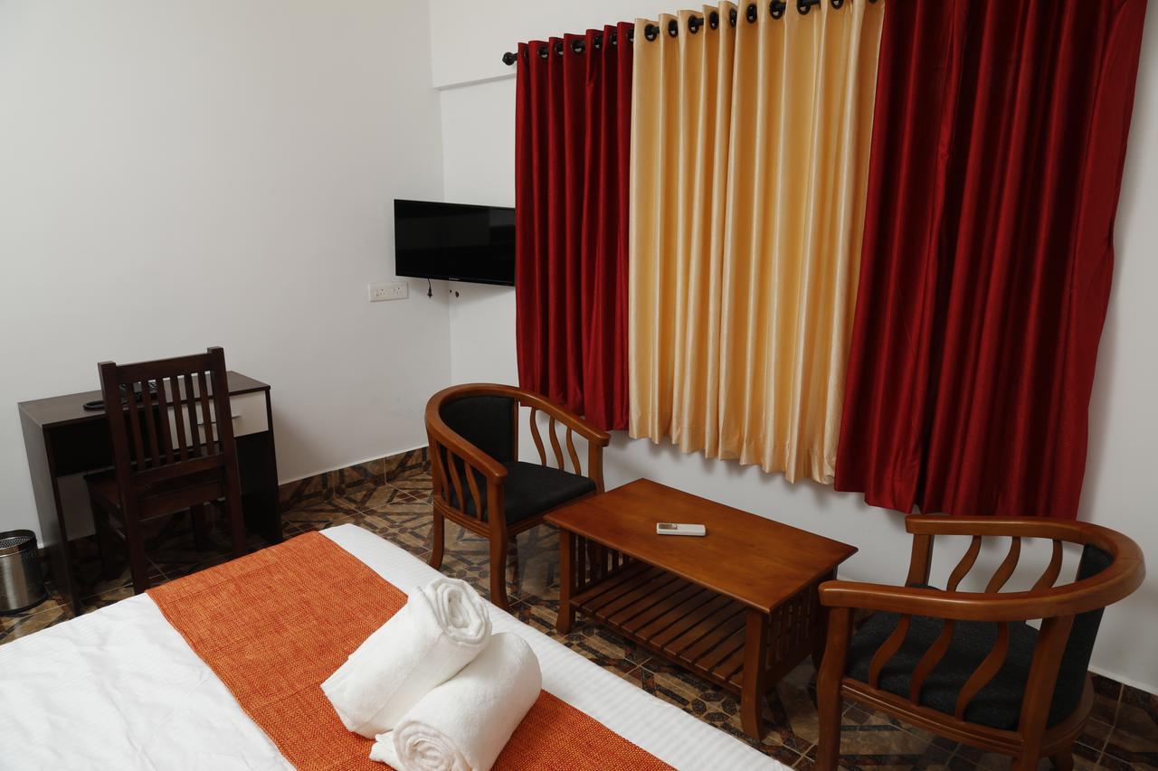 Puthens Clifton Inn Kottayam Eksteriør bilde