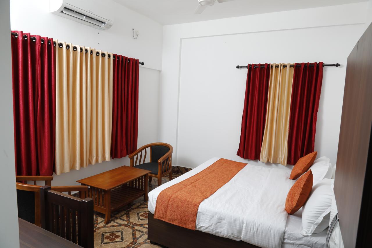 Puthens Clifton Inn Kottayam Eksteriør bilde